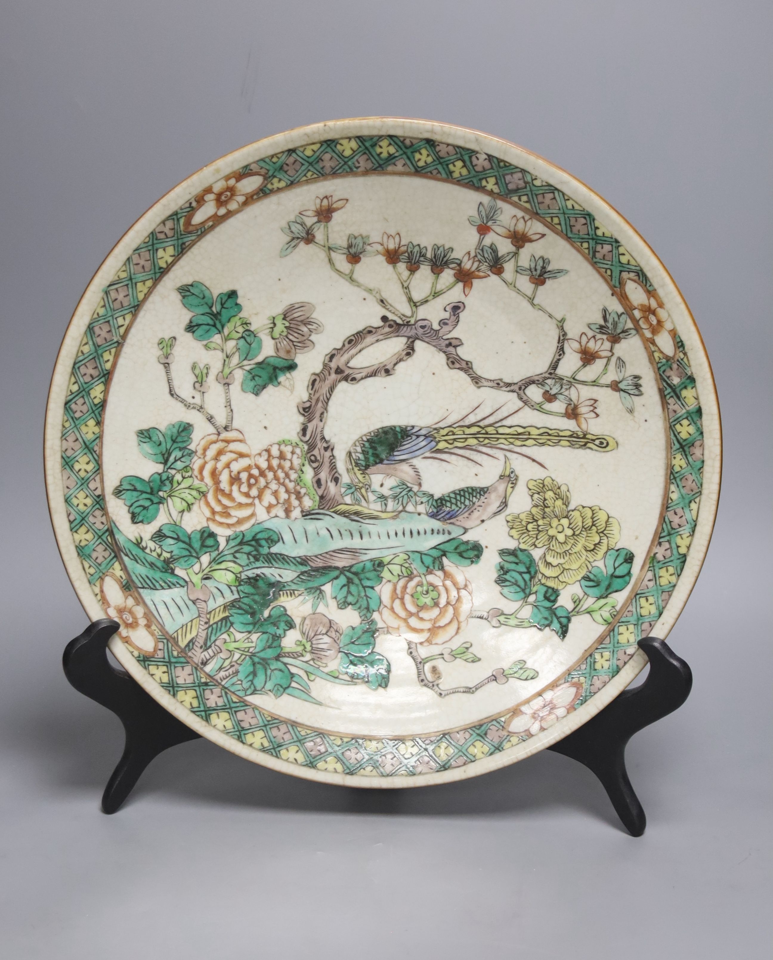 A 19th century Chinese famille verte crackle glaze dish and wood stand, diameter 35cm